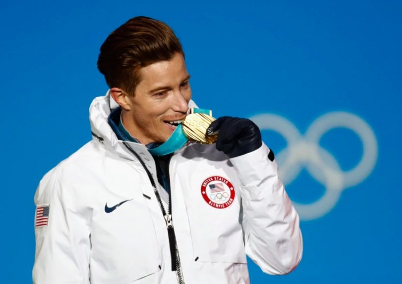 Shaun White poses with his gold medal.