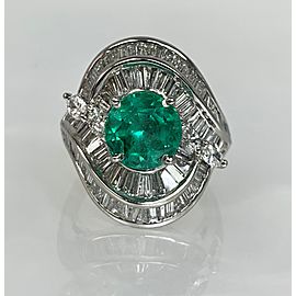 Platinum Round Shaped Emerald Diamond Ring