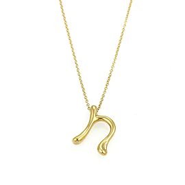 Tiffany & Co. Elsa Peretti Initial "n" 18k Yellow Gold Pendant Necklace