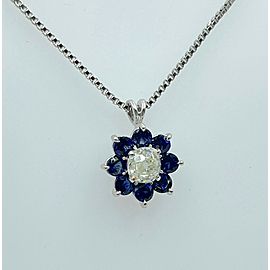 Old Cut Platinum Diamond Flower Pendant Necklace with Blue Sapphire Accents