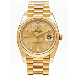 ROLEX DAY DATE 40 YELLOW GOLD WATCH WITH FACTORY CHAMPAGNE DIAMOND DIAL 228238
