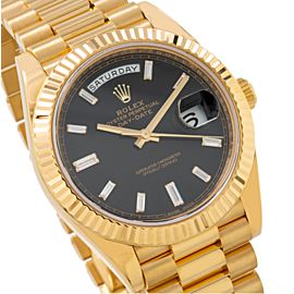 ROLEX DAY DATE 40 YELLOW GOLD WATCH WITH FACTORY BLACK DIAMOND DIAL 228238
