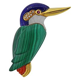 Colorful 18k gold bird brooch, set with lapis, malachite, white jade, coral, diamonds and ruby eye. The brooch measures 52mm x 25mm. Weighs 26.6 grams.