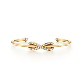 Tiffany & Co. Infinity Yellow Gold Diamond Cuff, Medium size