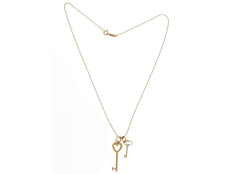 Tiffany & Co Double Key Diamond Pendant Necklace In 18K Yellow Gold