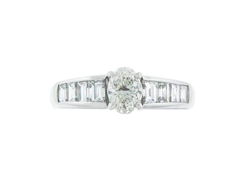 Platinum Oval and Emerald cut Diamond Ring