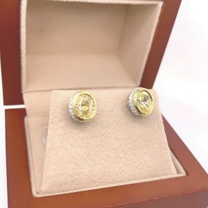 Fancy Yellow Oval Diamond 2.25 tcw Earrings Bezel Set in 18kt Yellow Gold Plat