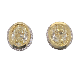 Fancy Yellow Oval Diamond 2.25 tcw Earrings Bezel Set in 18kt Yellow Gold Plat