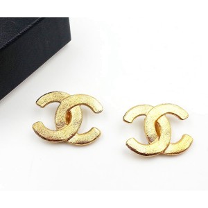 Chanel Gold Tone Metal Sand Texture Clip on Earrings 