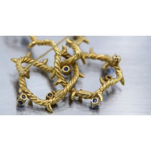 Cartier, New York 18 Karat Gold and Sapphire Bow Shaped Brooch