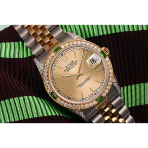 Women's Rolex 31mm Datejust Champagne Index Dial Two Tone Watch with Emeralds & Diamonds