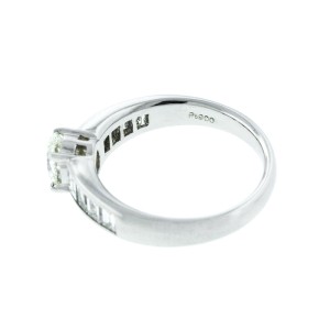 Platinum Oval and Emerald cut Diamond Ring