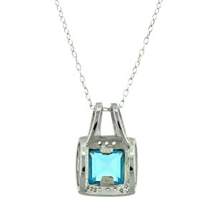 Sterling Silver and Blue Topaz Necklace, Ring, and Earrings Set