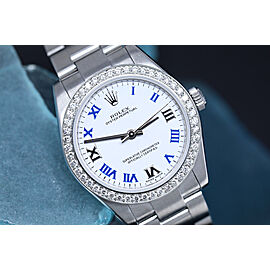 Rolex Oyster Perpetual White Dial Blue Numerals Ladies Stainless Steel Watch with Diamond Bezel